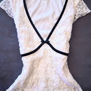 Elegant Lace Top with Black Trim
